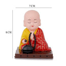 Solar-Powered Praying Buddha Figurine with Moving Head – Dashboard & Home Decor